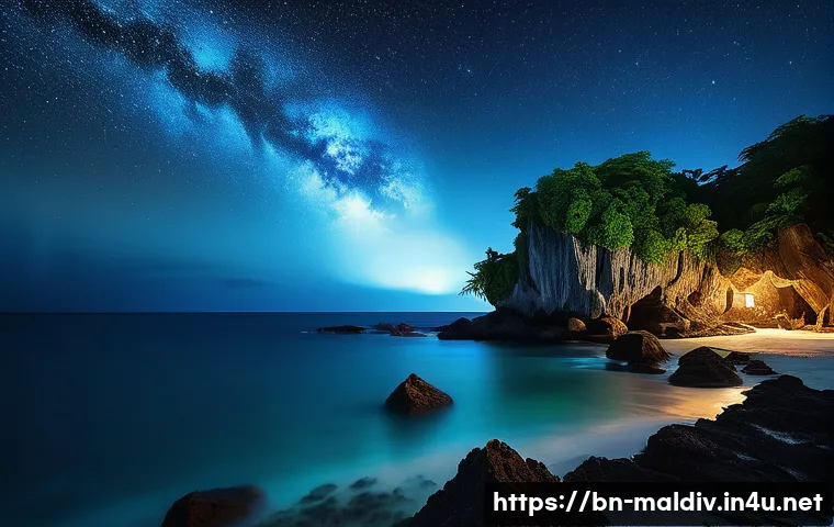 몰디브의 독특한 전설 - A mystical nighttime scene along the Maldivian coastline, featuring ancient rocky caves and jagged c...